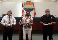 Councilman Doug Quartier, Ms. Nancy Budd and Mayor Bill Hall.