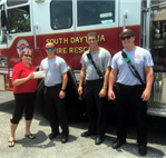 Angie Warga, New Life Martial Arts, donating PPE equipment to Fire Department personnel.